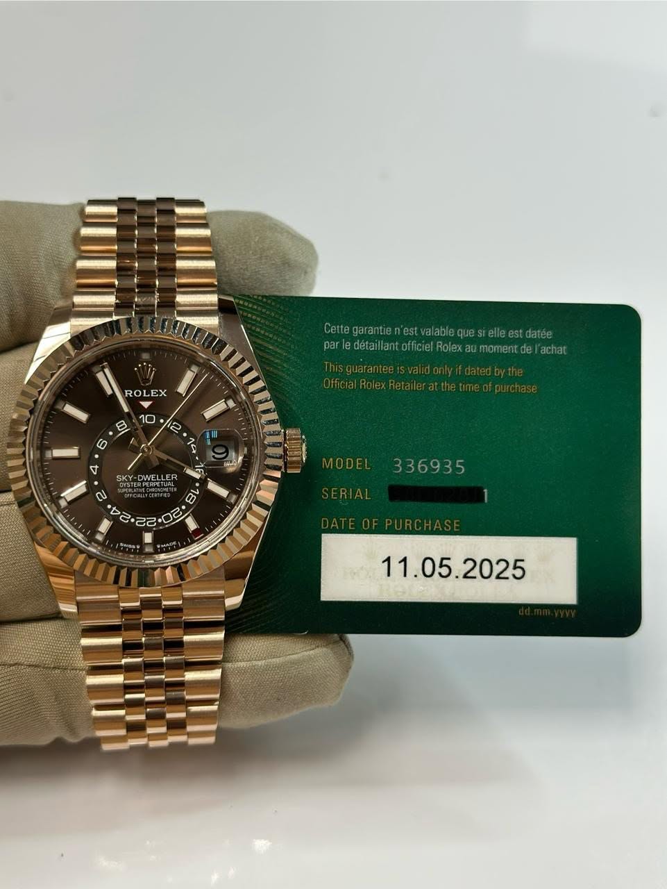 May be an image of wrist watch and text