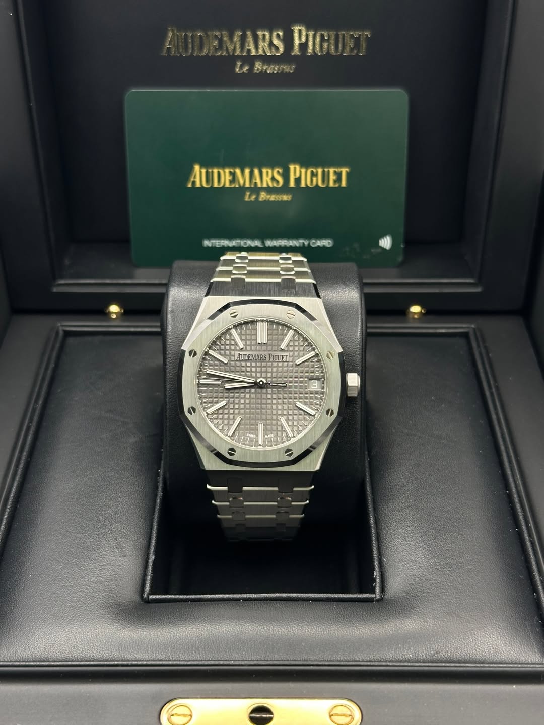 May be an image of wrist watch and text