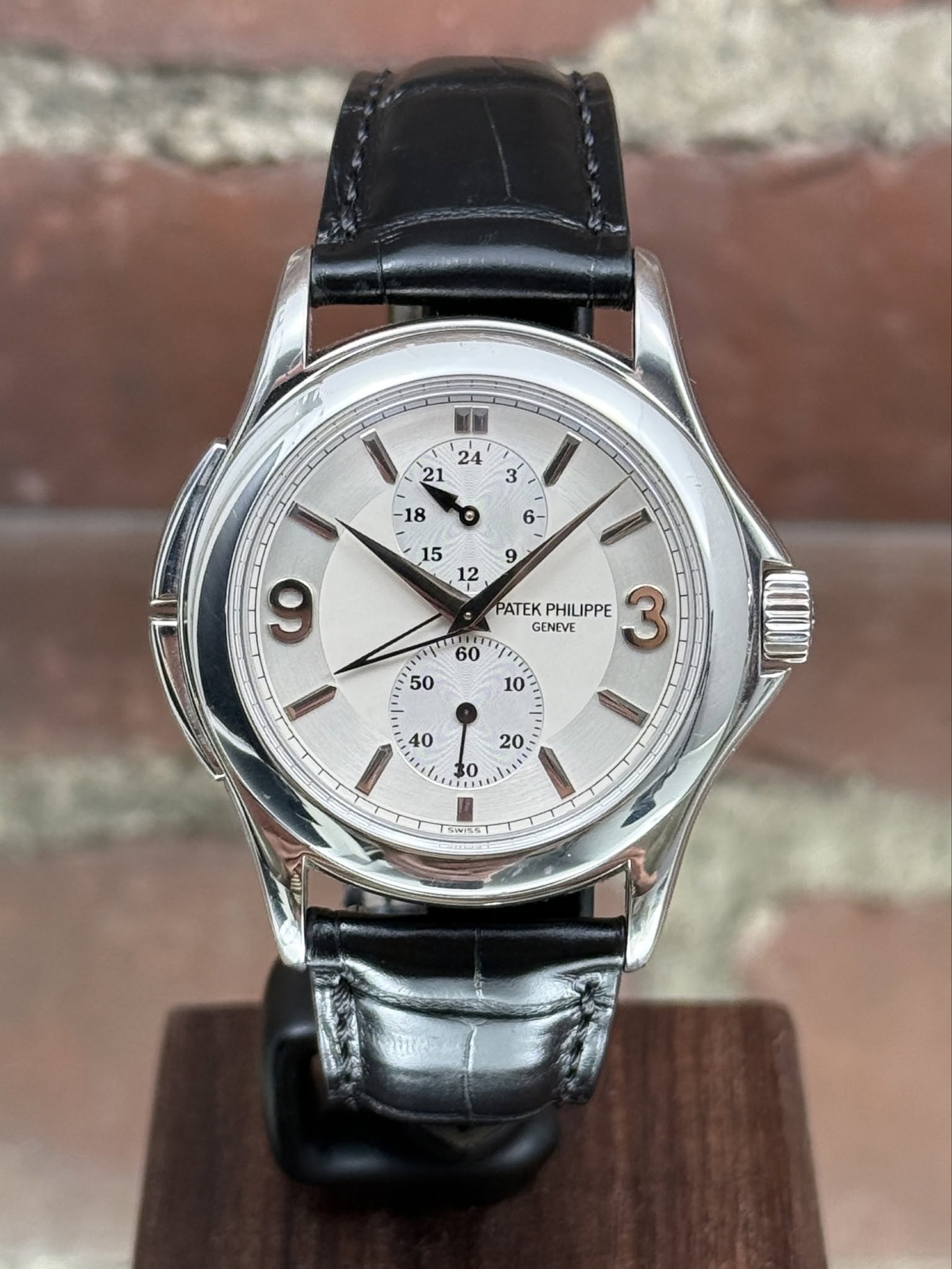 May be an image of wrist watch and text that says ' ခ 6- 9 9 م 15 12 PATEK PHILIPPE 3 GENEVE '