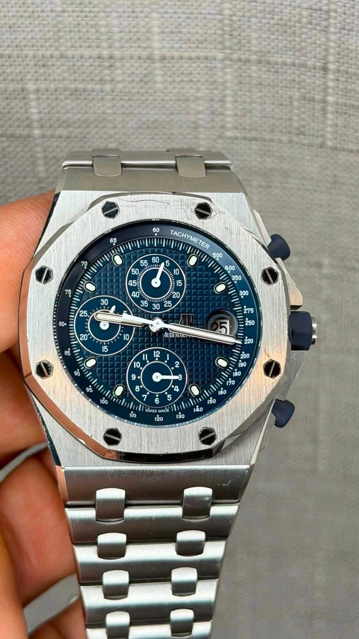 May be an image of wrist watch and text that says '65 ॐੈ TACHYMETER Koo E b ဆဲ జ 10 & 15 ខ្ាំ جله .ዜ. .និ 275 ALDENXIO 12 2 8+ 10 2 9+ - 99 8 8 B vÓ0 ل B0 កច 0۵ 60 ।కೆಂ 140 MAC…