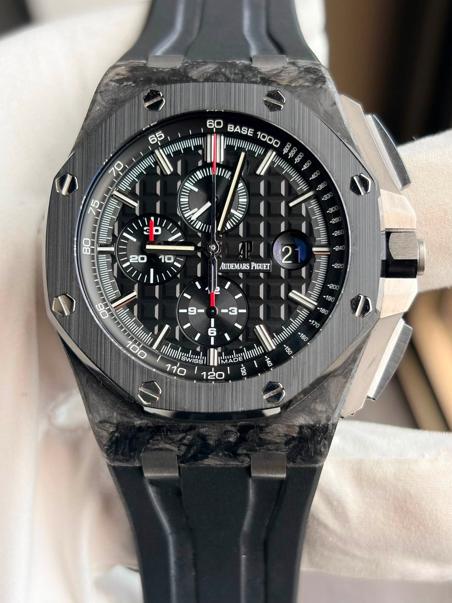 May be an image of wrist watch and text