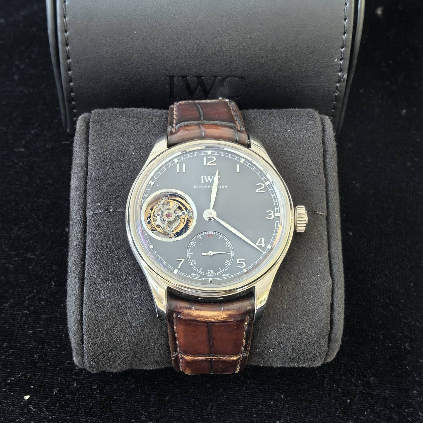 May be an image of wrist watch and text