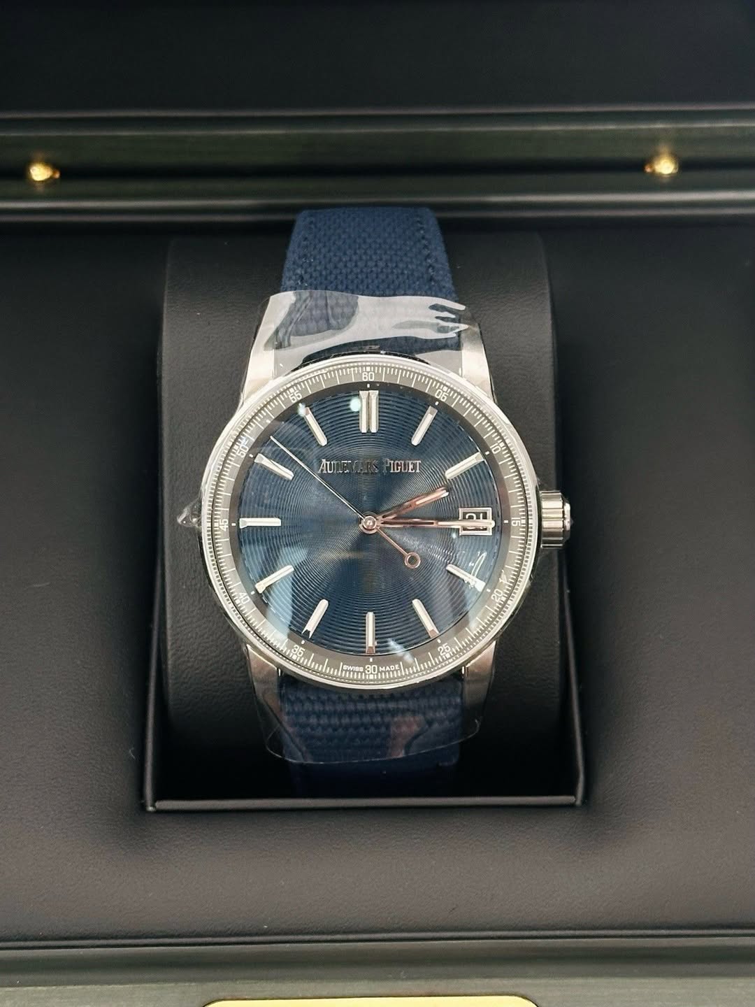 May be an image of wrist watch and text