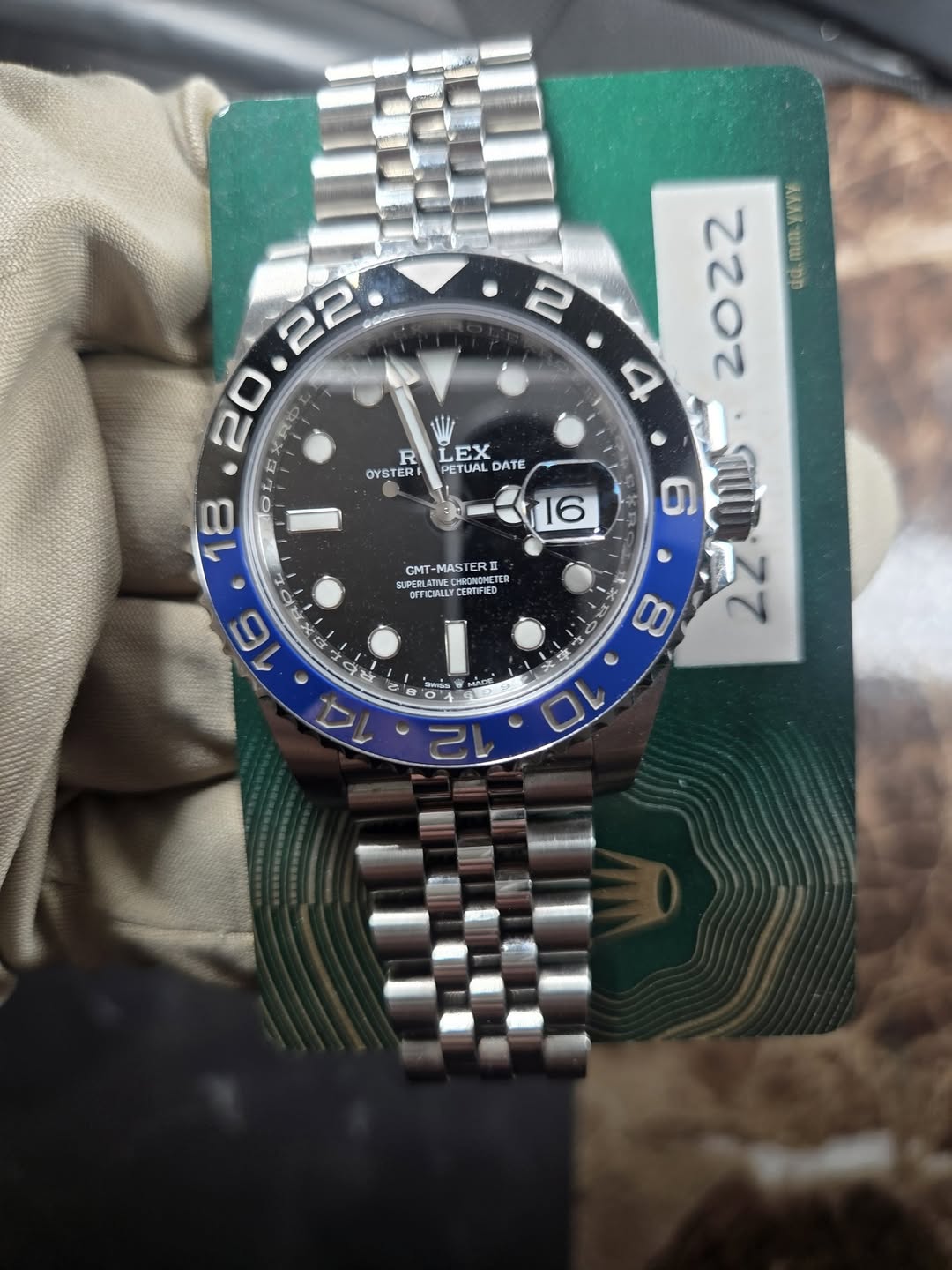 May be an image of wrist watch and text