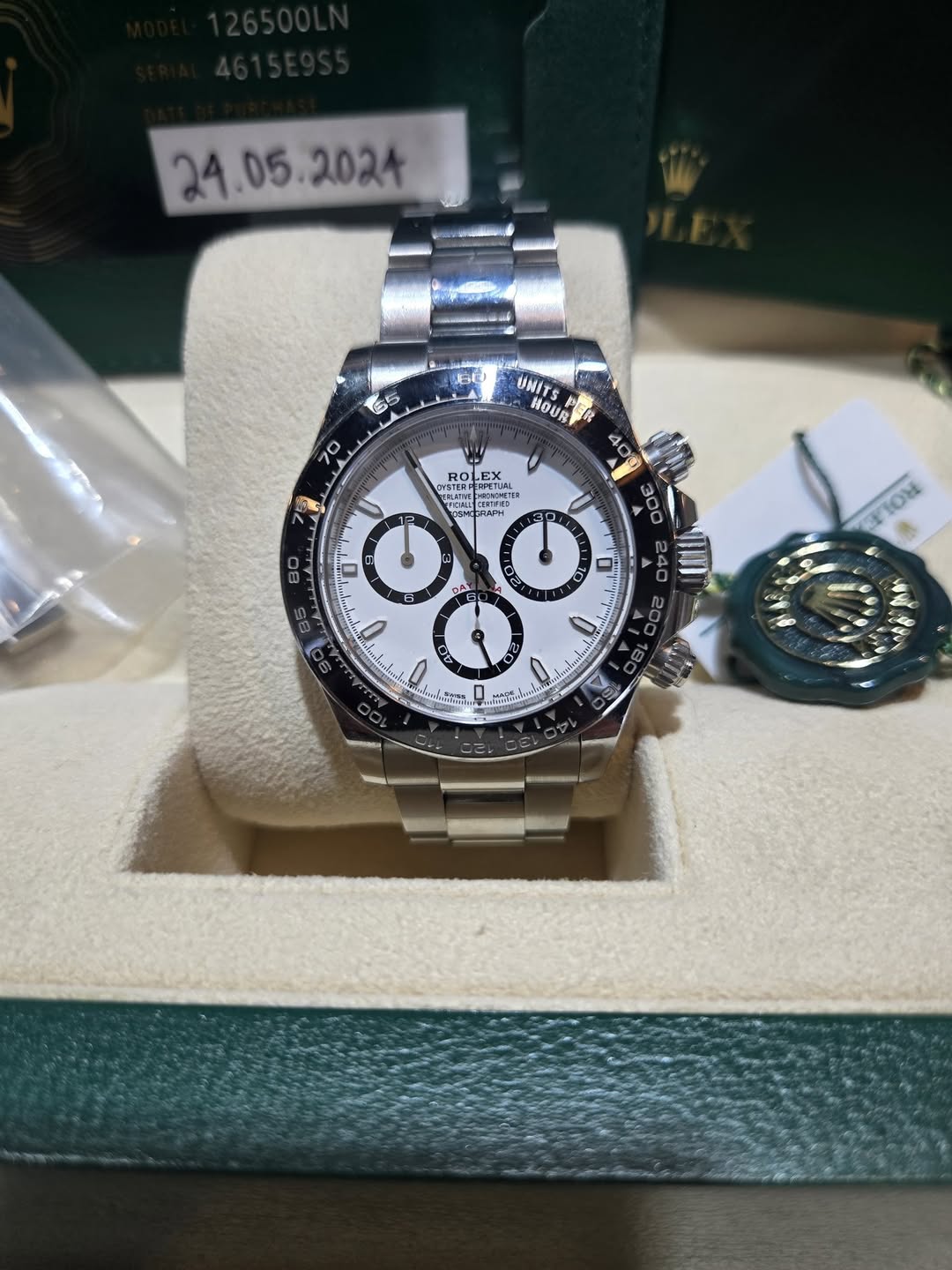 May be an image of wrist watch and text