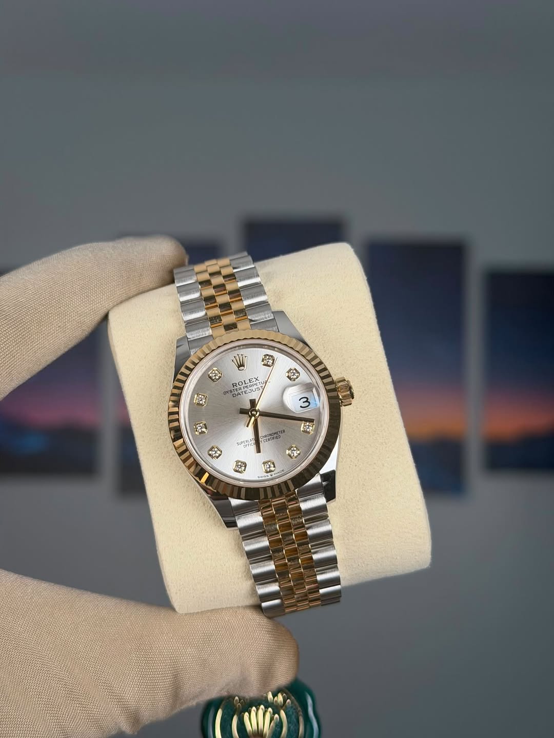 May be an image of wrist watch and text