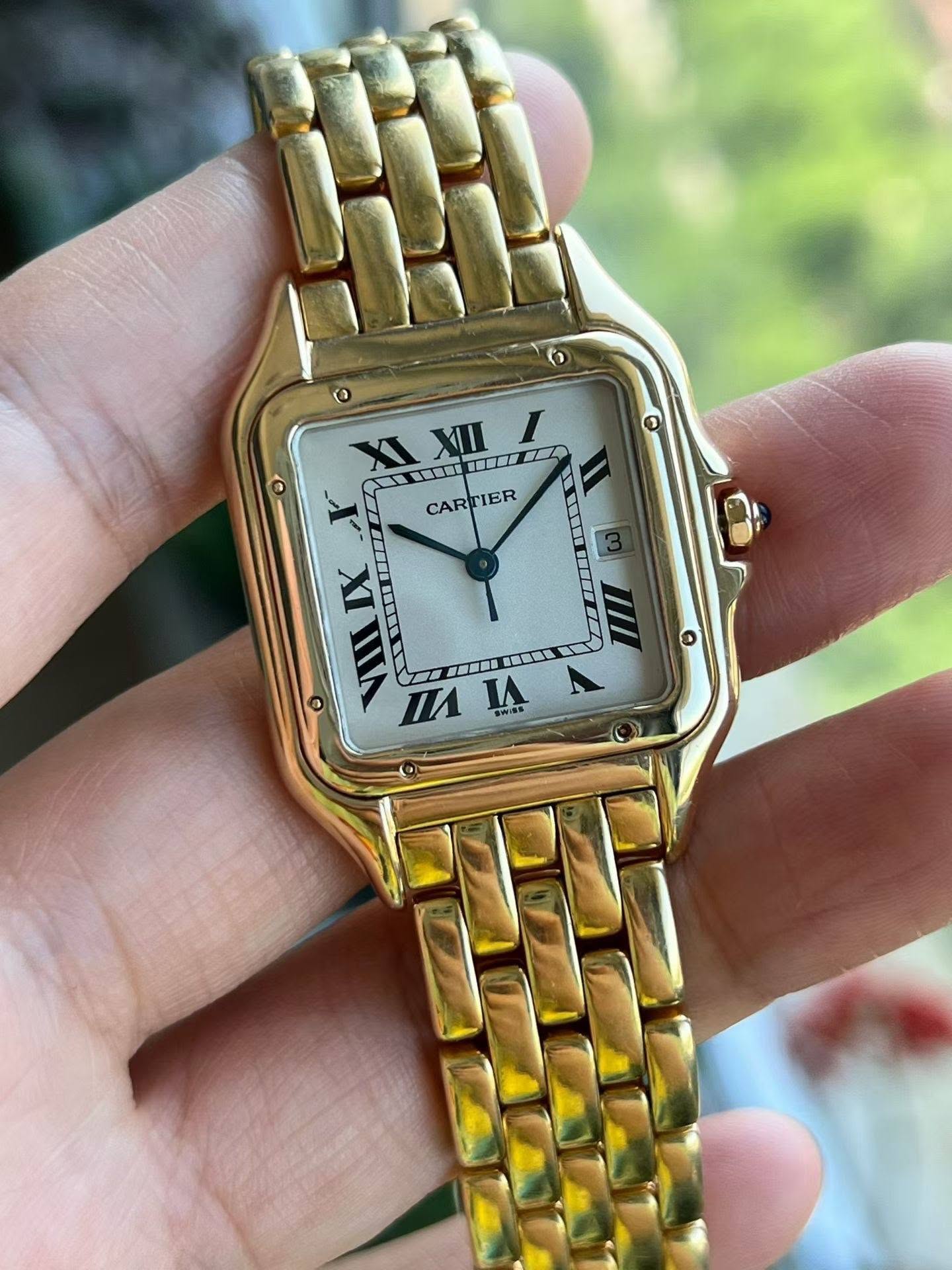 May be an image of digital watch and text