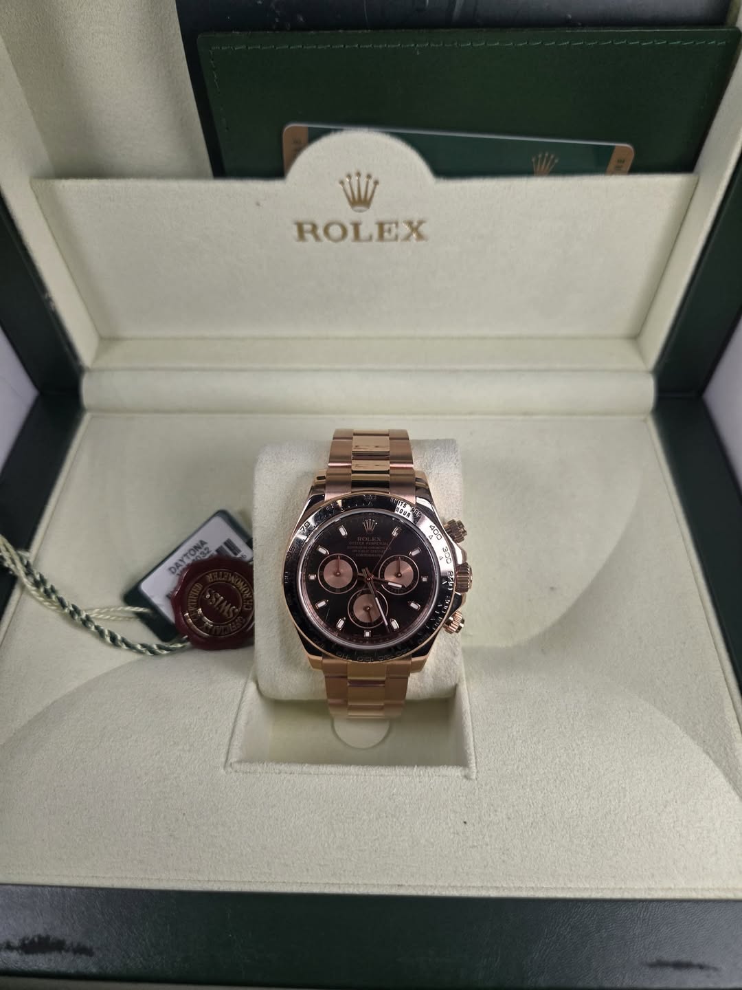 May be an image of wrist watch and text