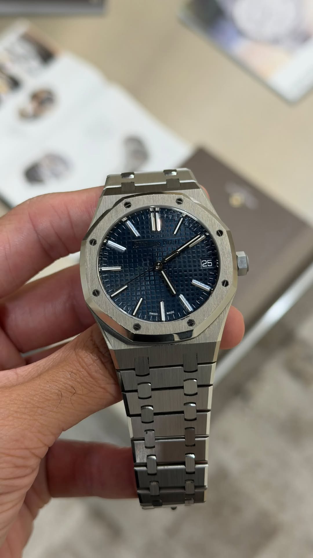 May be an image of wrist watch and text