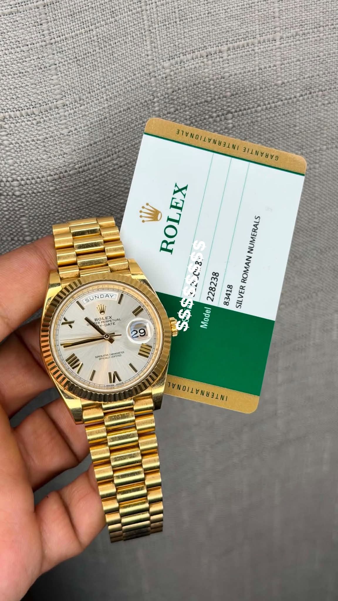 May be an image of wrist watch and text