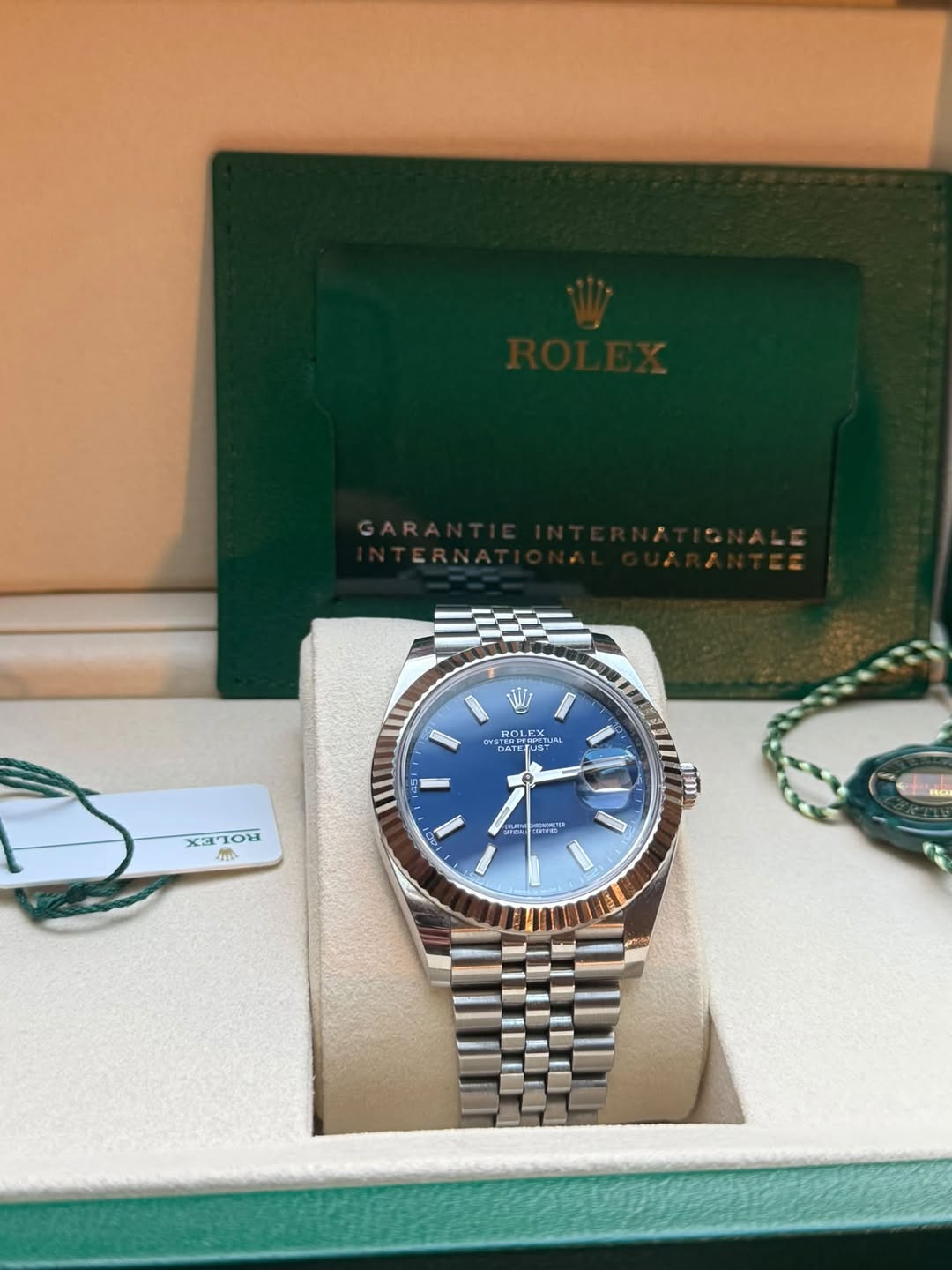 May be an image of wrist watch and text