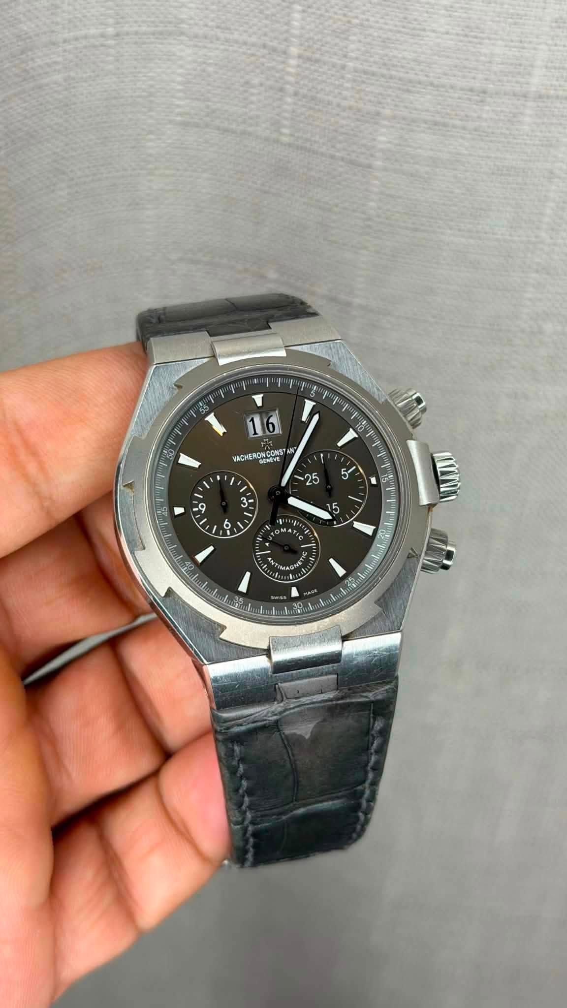 May be an image of wrist watch and text