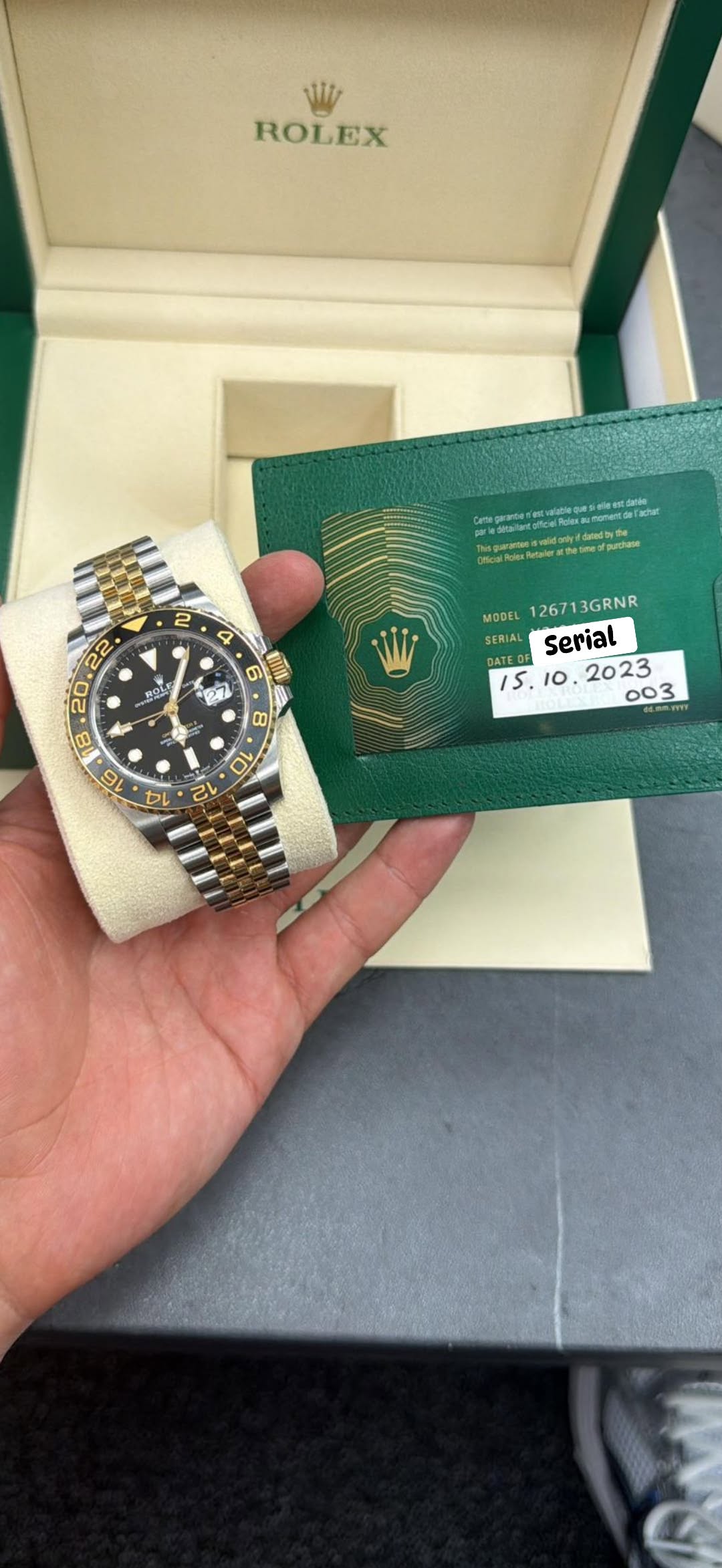 May be an image of wrist watch and text