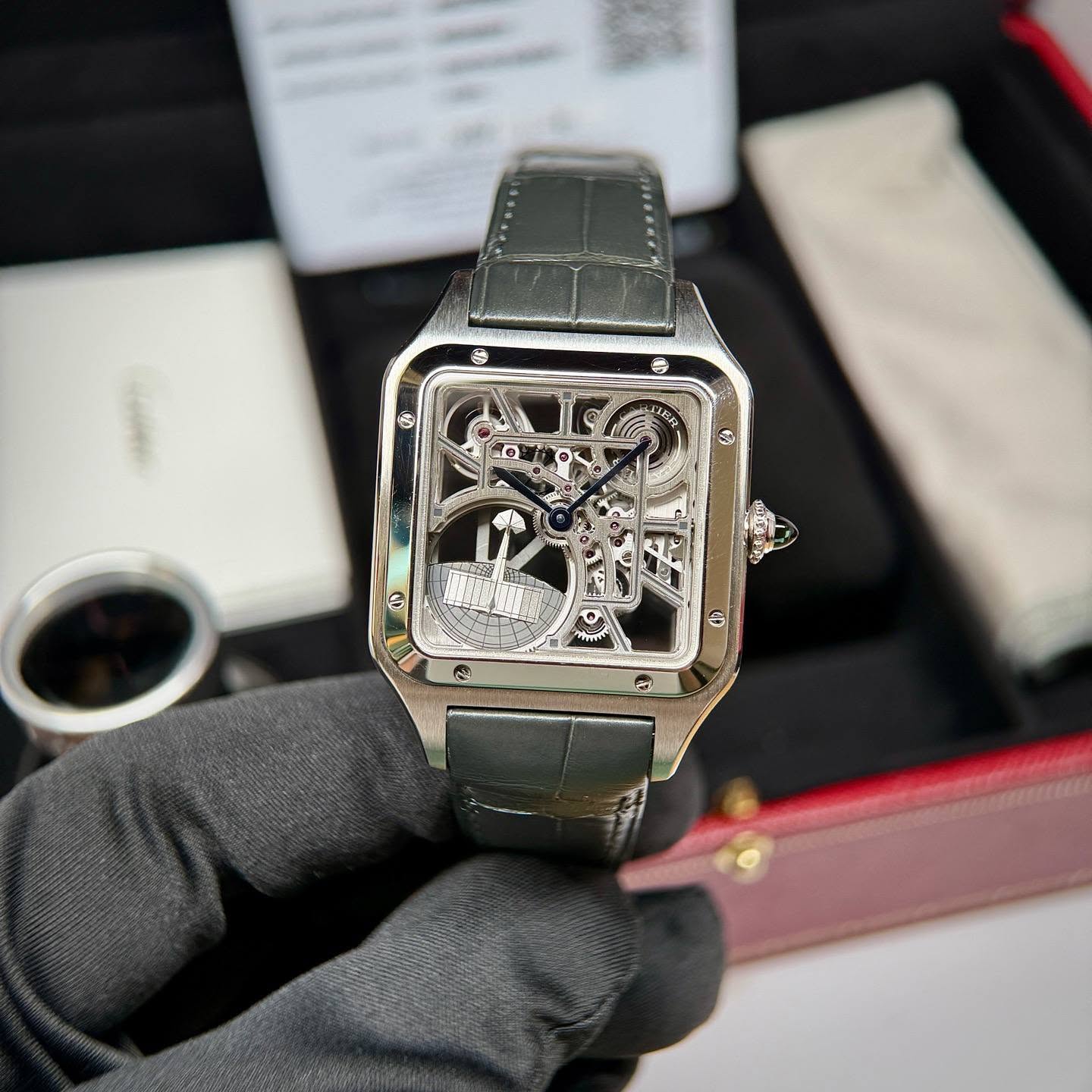 May be an image of wrist watch and text