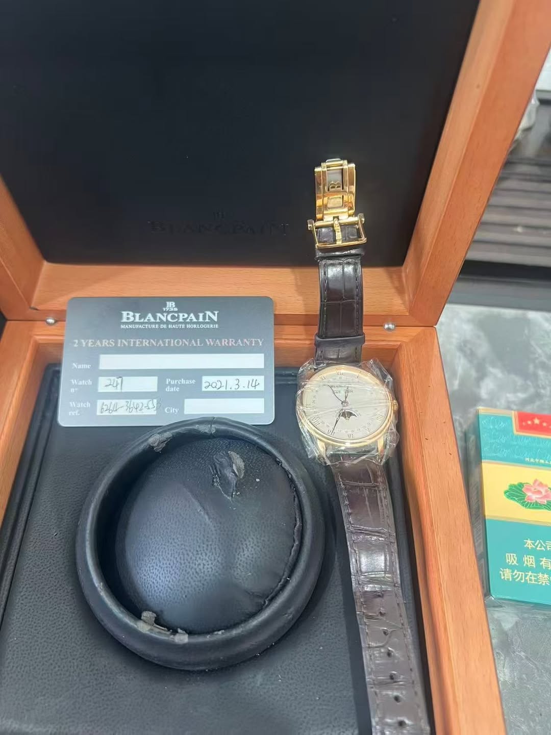 May be an image of wrist watch and text