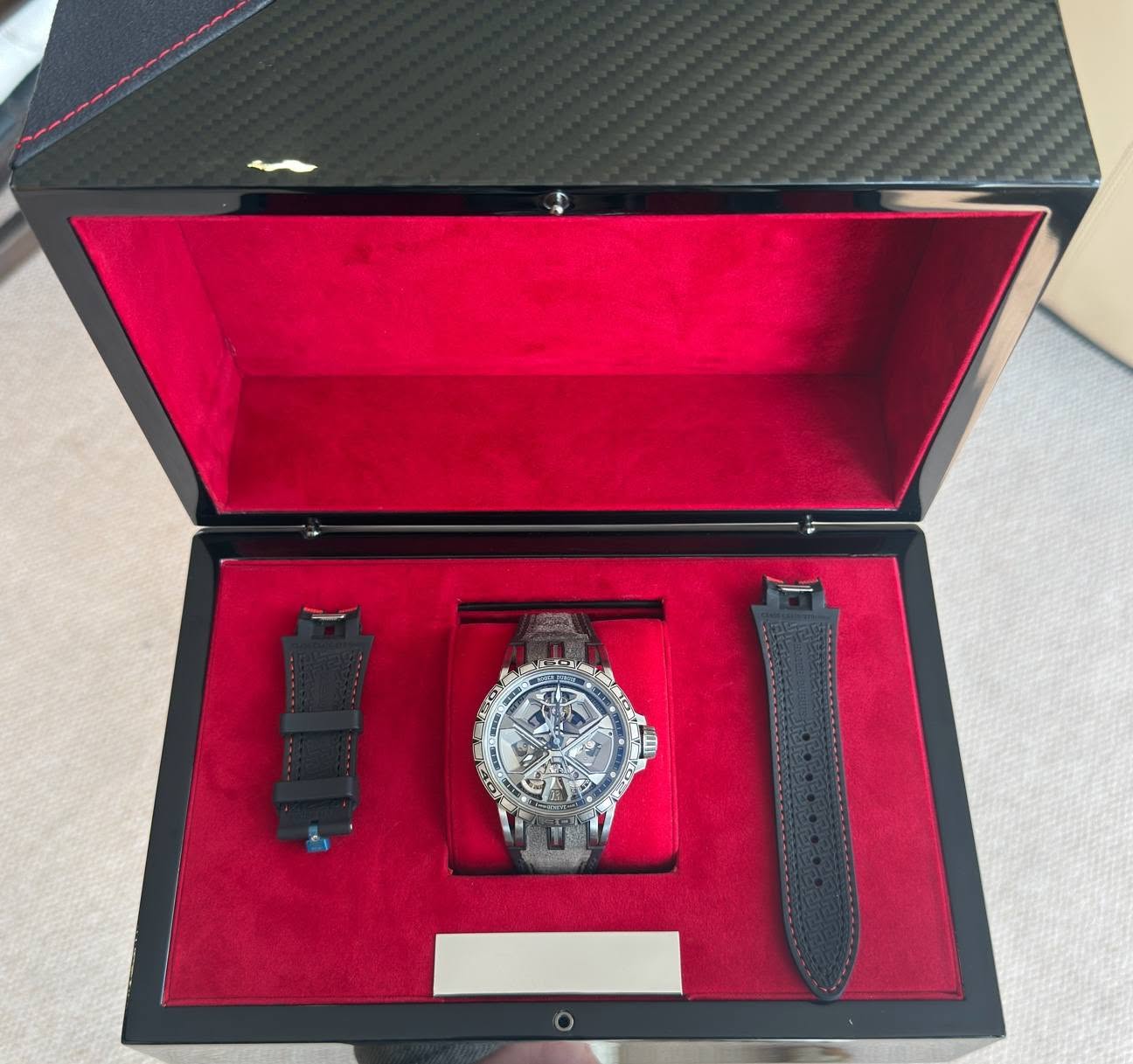 May be an image of wrist watch and text