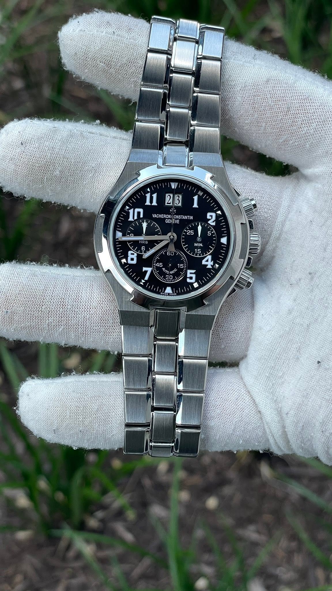 May be an image of wrist watch and text