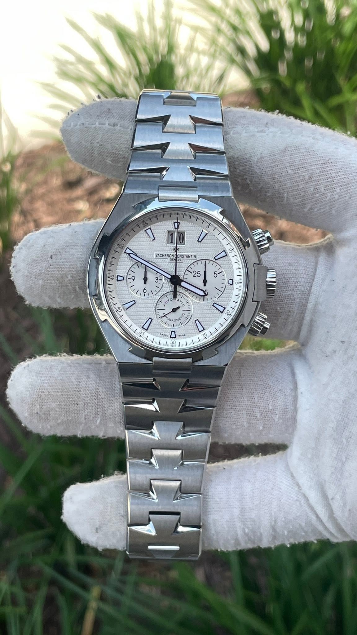 May be an image of wrist watch and text