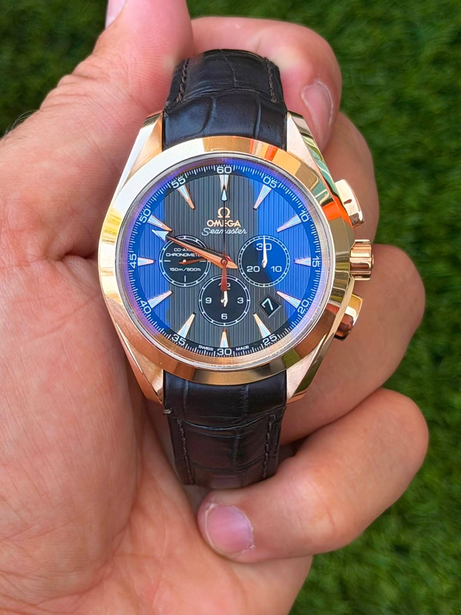 May be an image of wrist watch and text