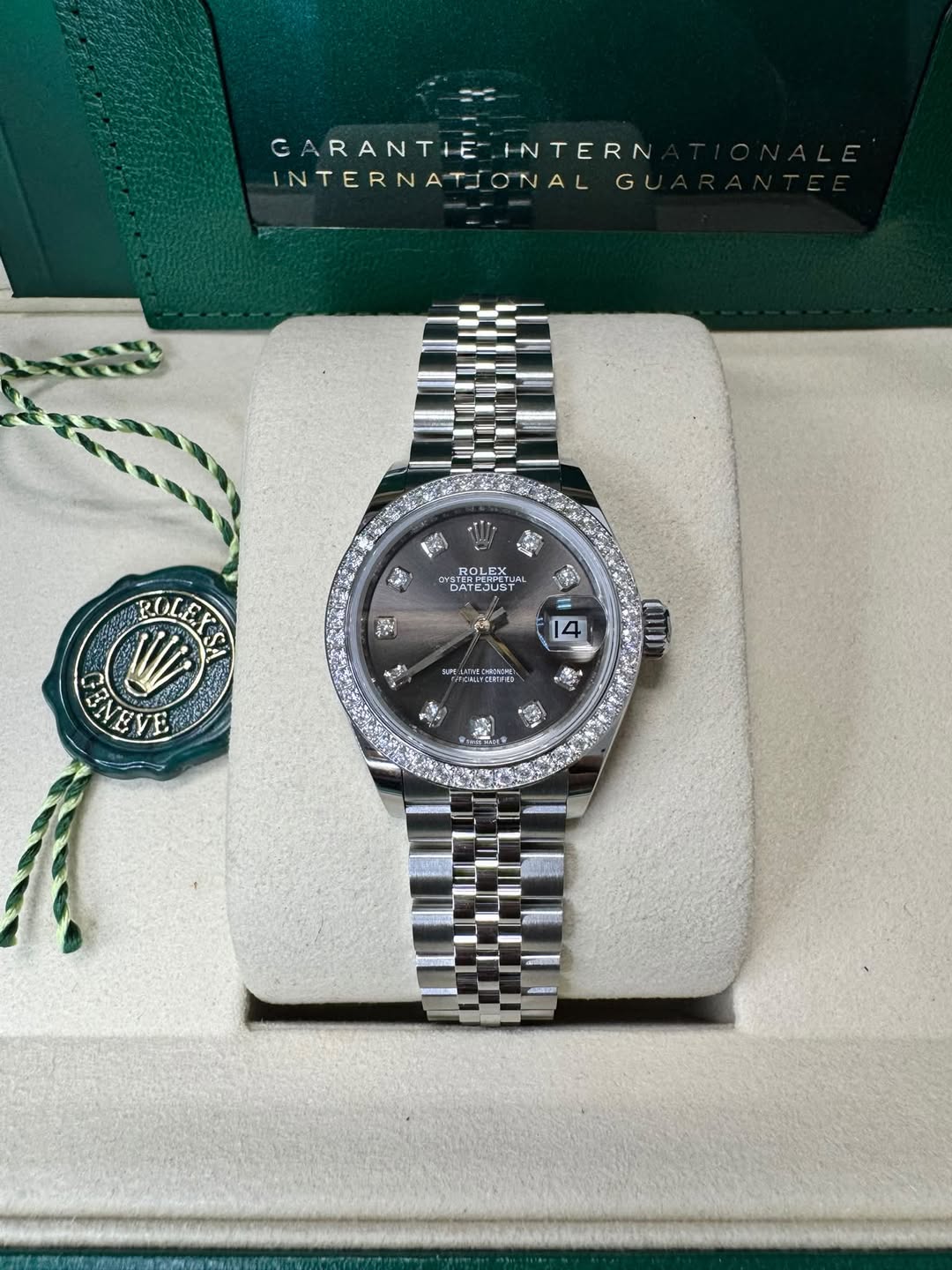 May be an image of wrist watch and text
