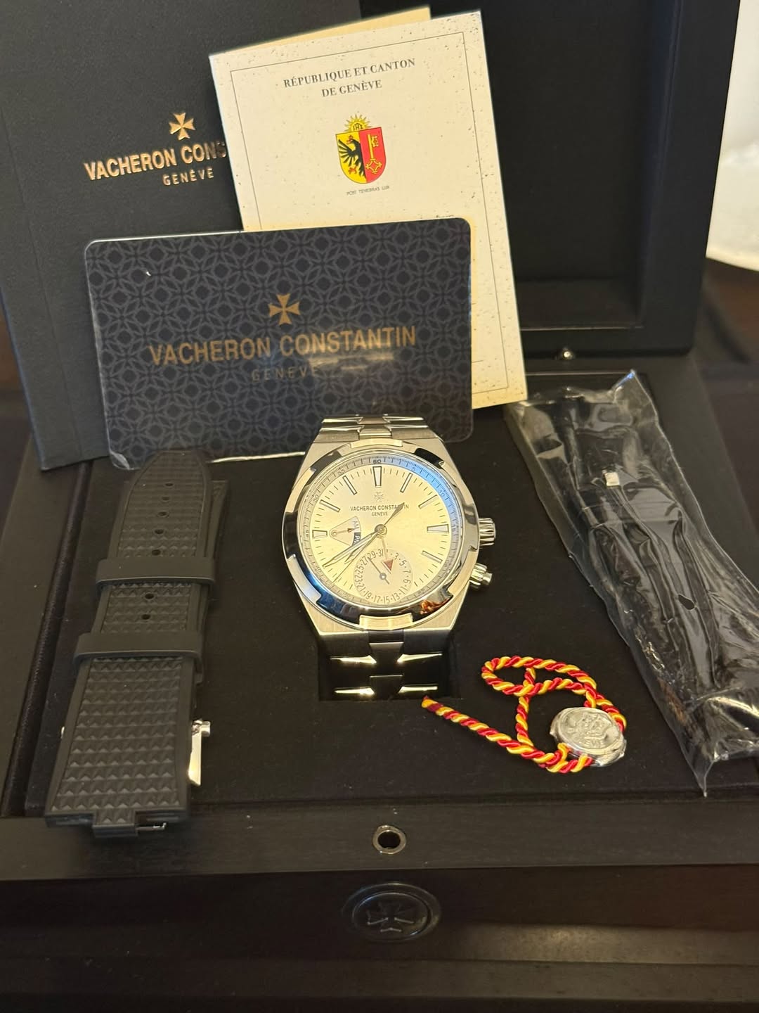 May be an image of wrist watch and text
