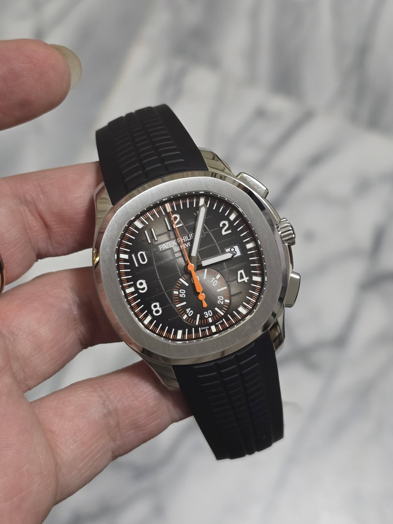 May be an image of wrist watch and text that says 'HILIF PAT PATEK EVE 10 Q ي sa 0 = 50 3 す 20 I o 30'
