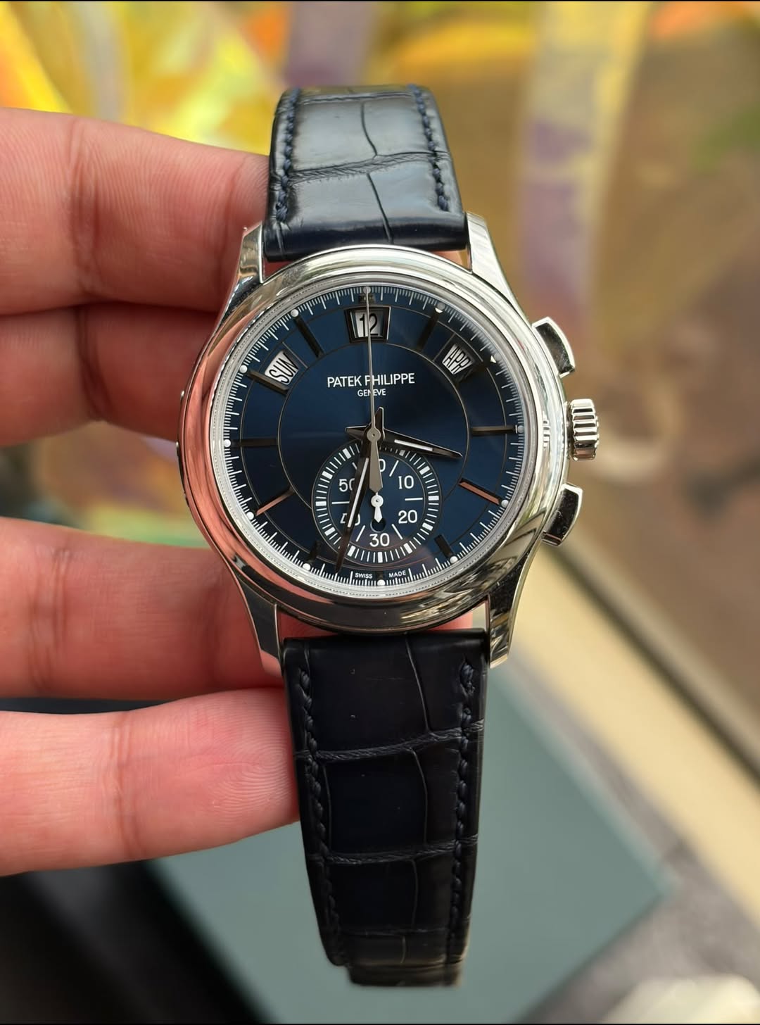 May be an image of wrist watch and text