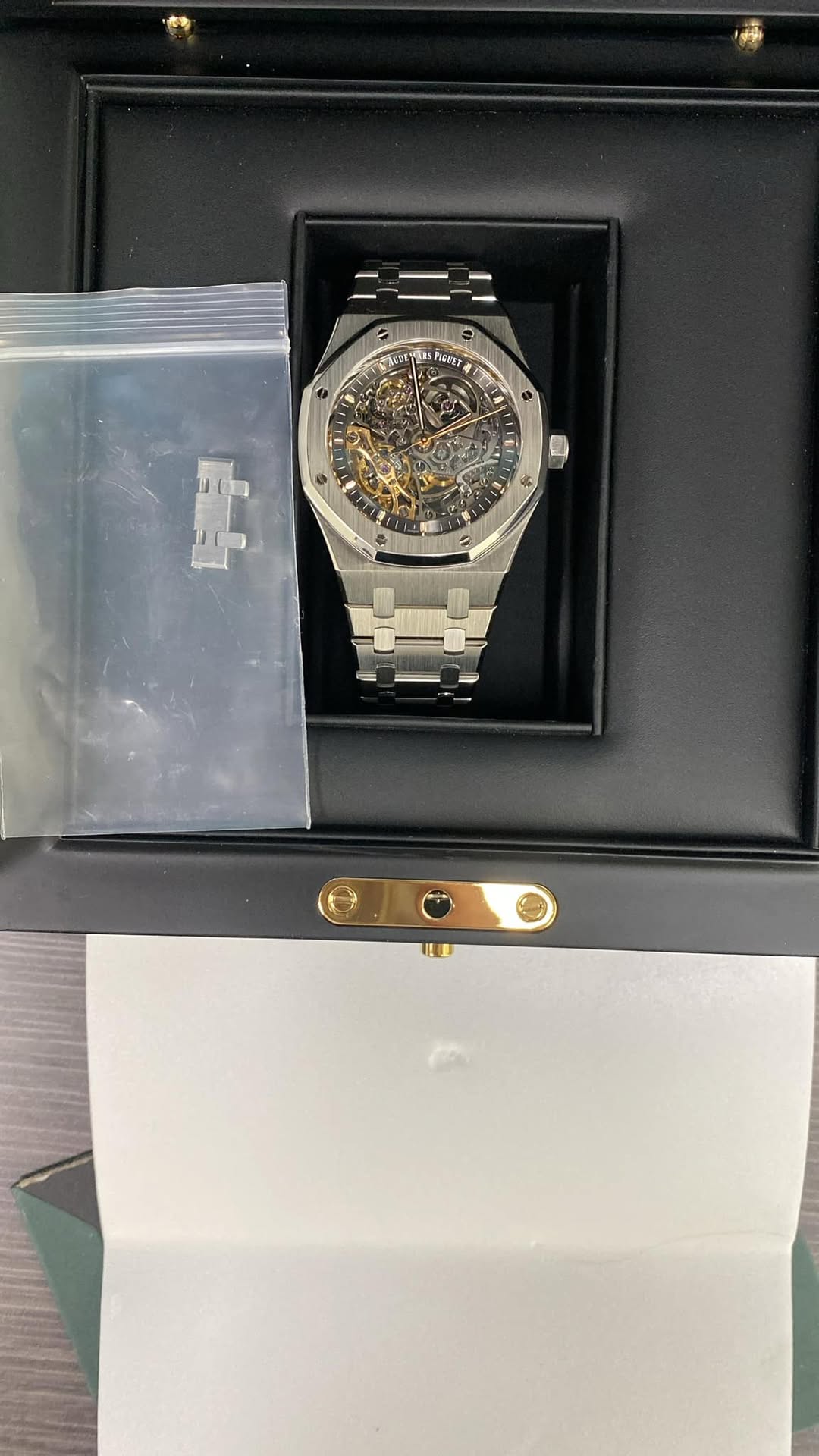 May be an image of wrist watch and text