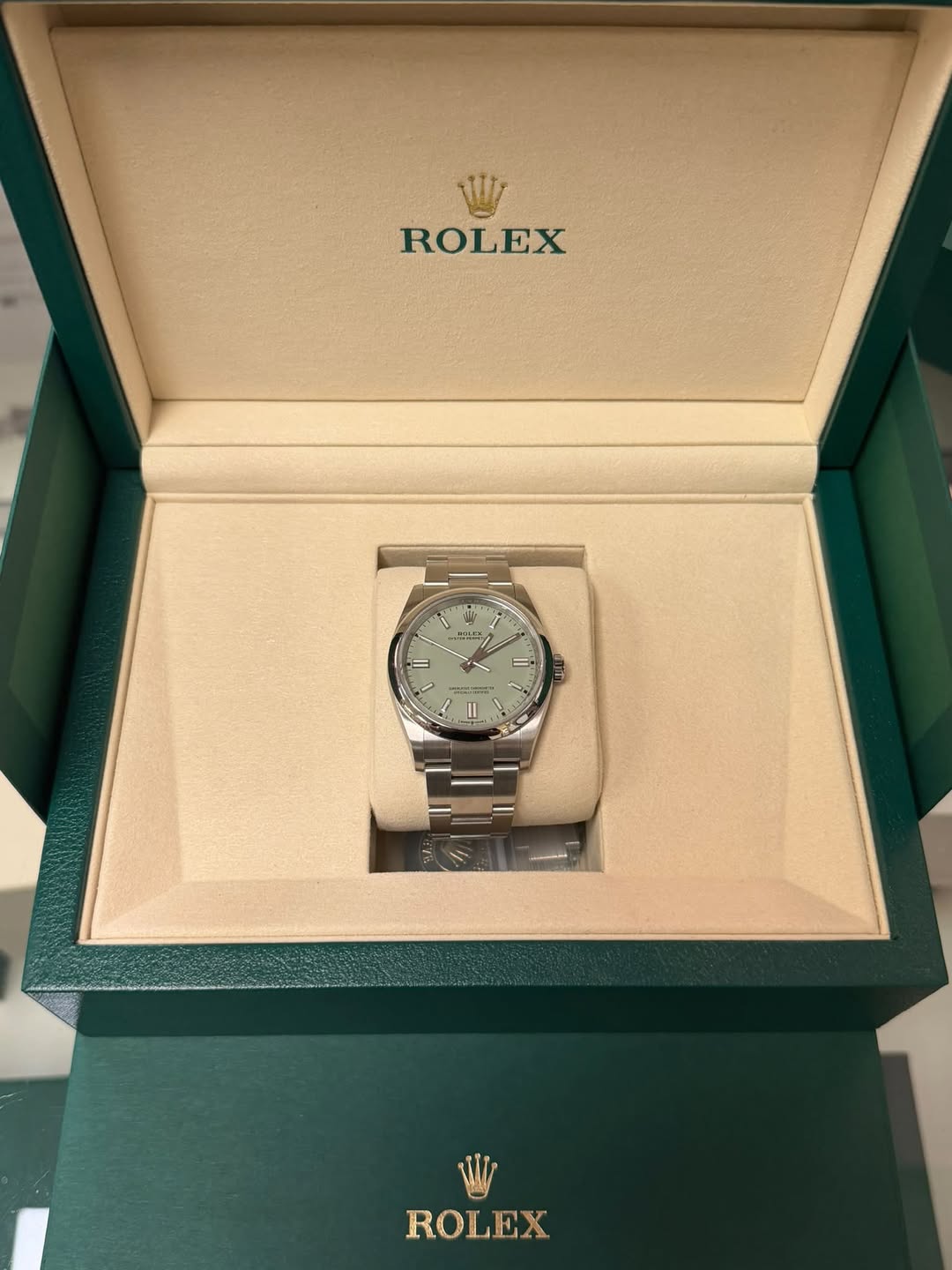 May be an image of wrist watch and text