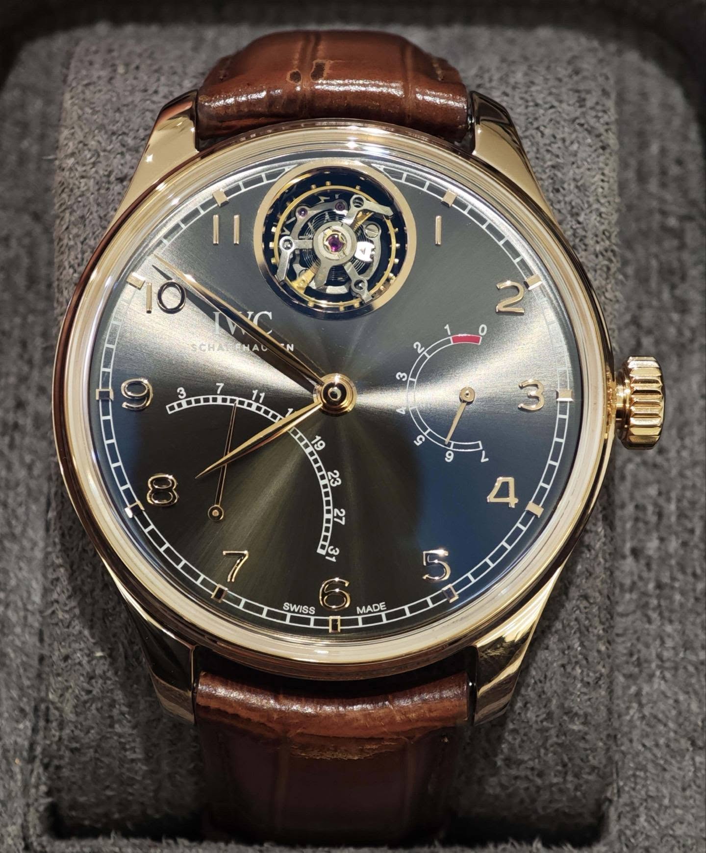 May be an image of wrist watch and text