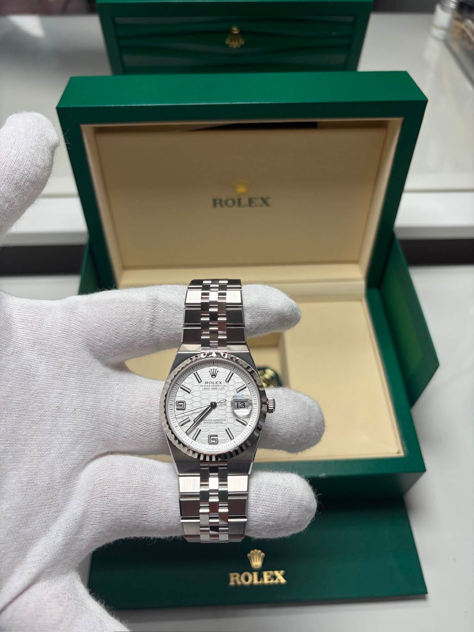 May be an image of wrist watch and text