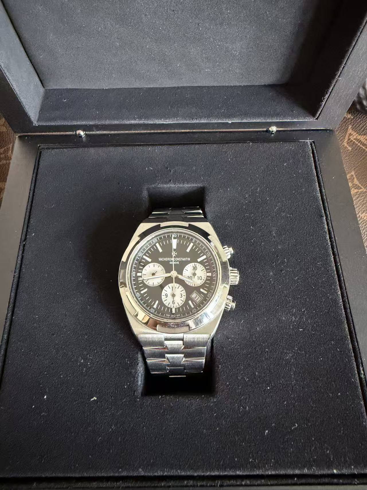 May be an image of wrist watch and text