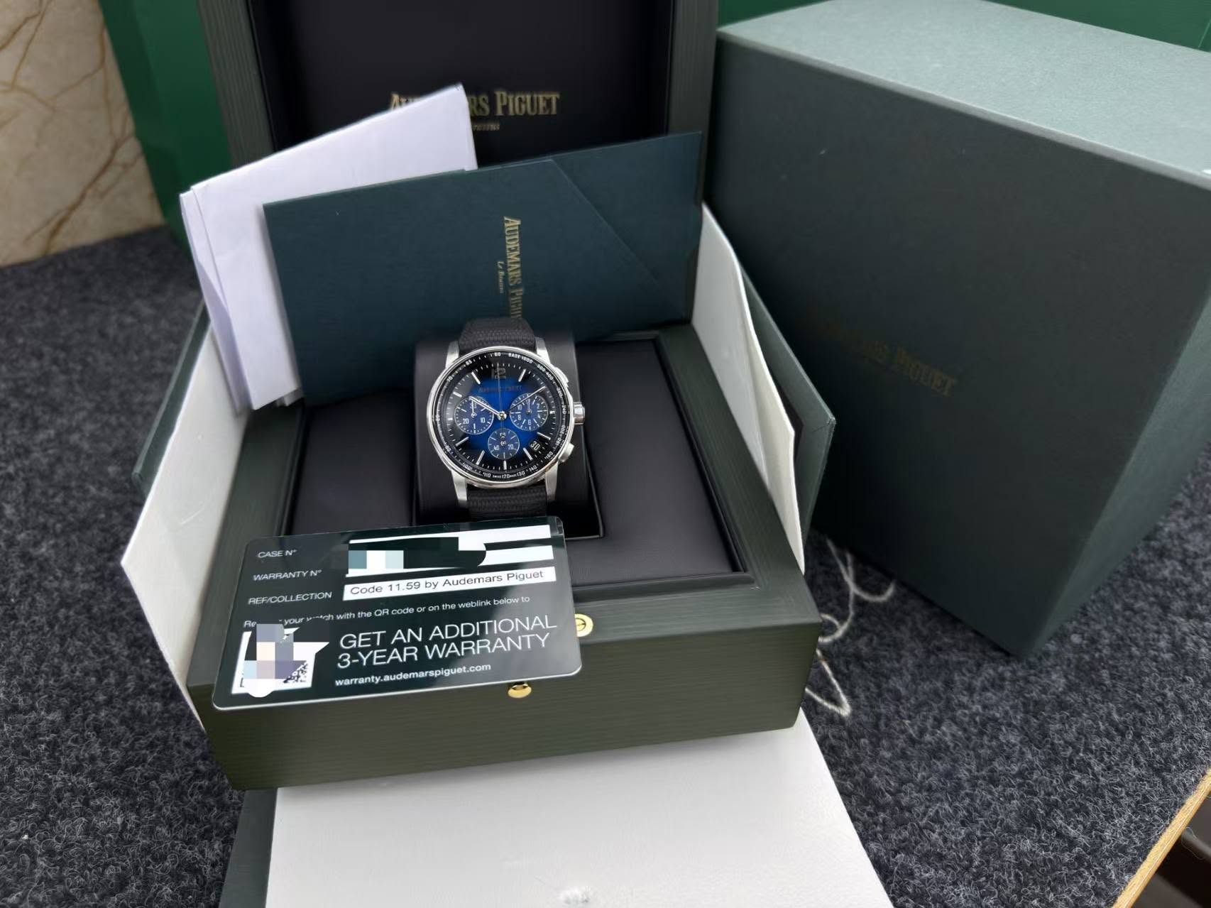 May be an image of wrist watch and text that says 'AUDEMA 九 CASE MAPHANTYN REF/COLLECTION Code 11.50b by Audemnors Piguet belowto ADDITIONAL GET AN 3-YEAR WARRANTY 3-YEARWARRANTY…