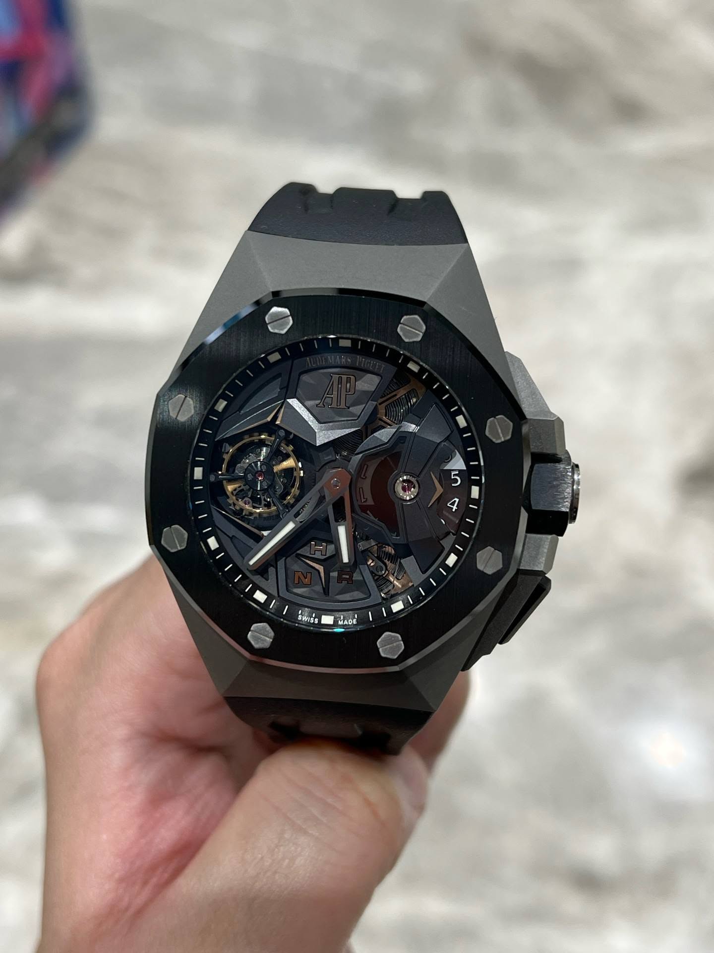 May be an image of wrist watch and text