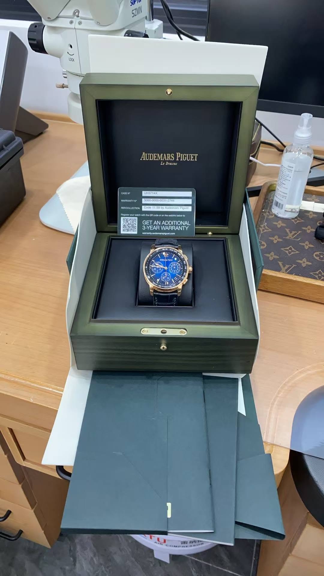 May be an image of wrist watch and text