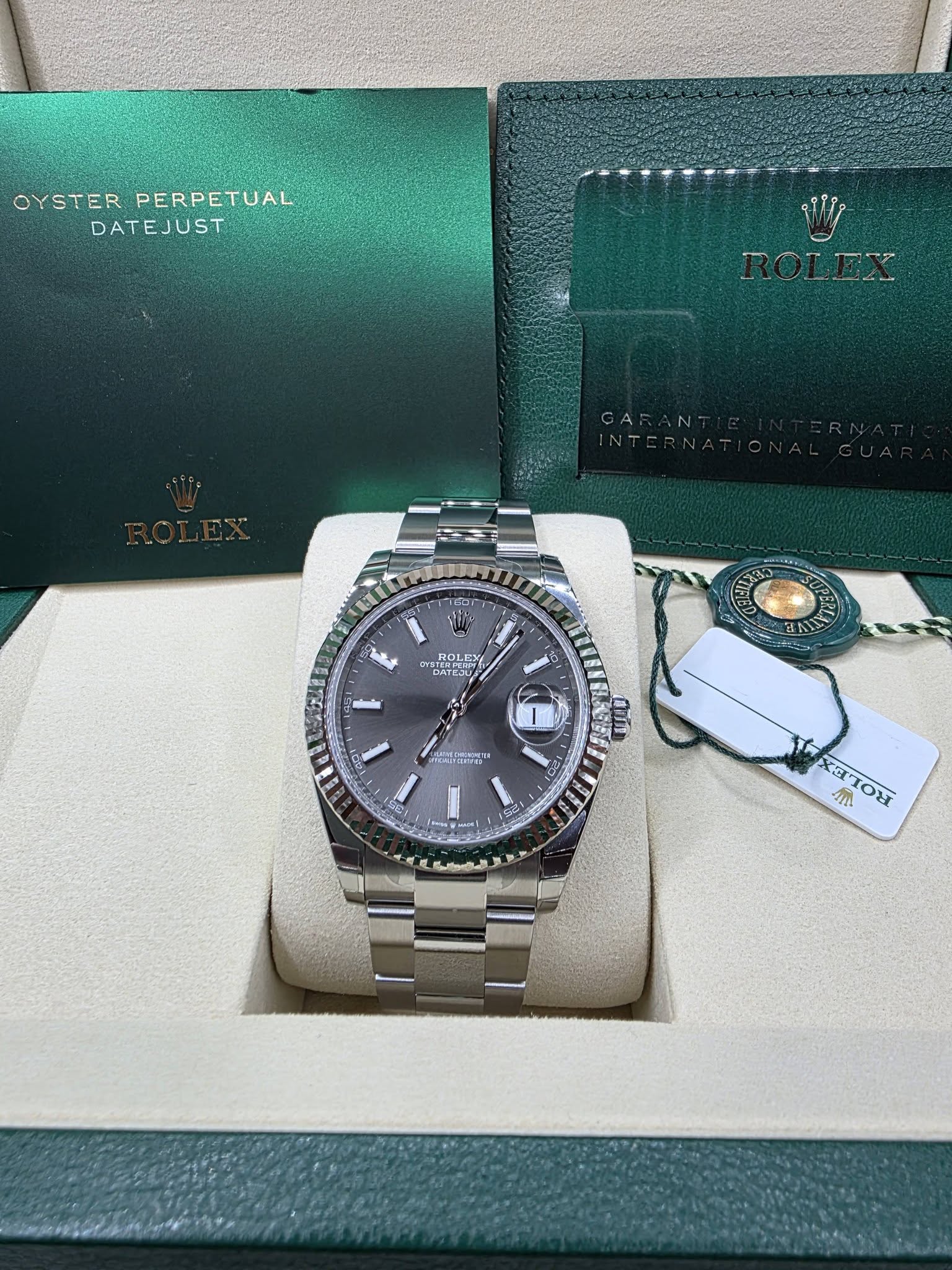 May be an image of wrist watch and text