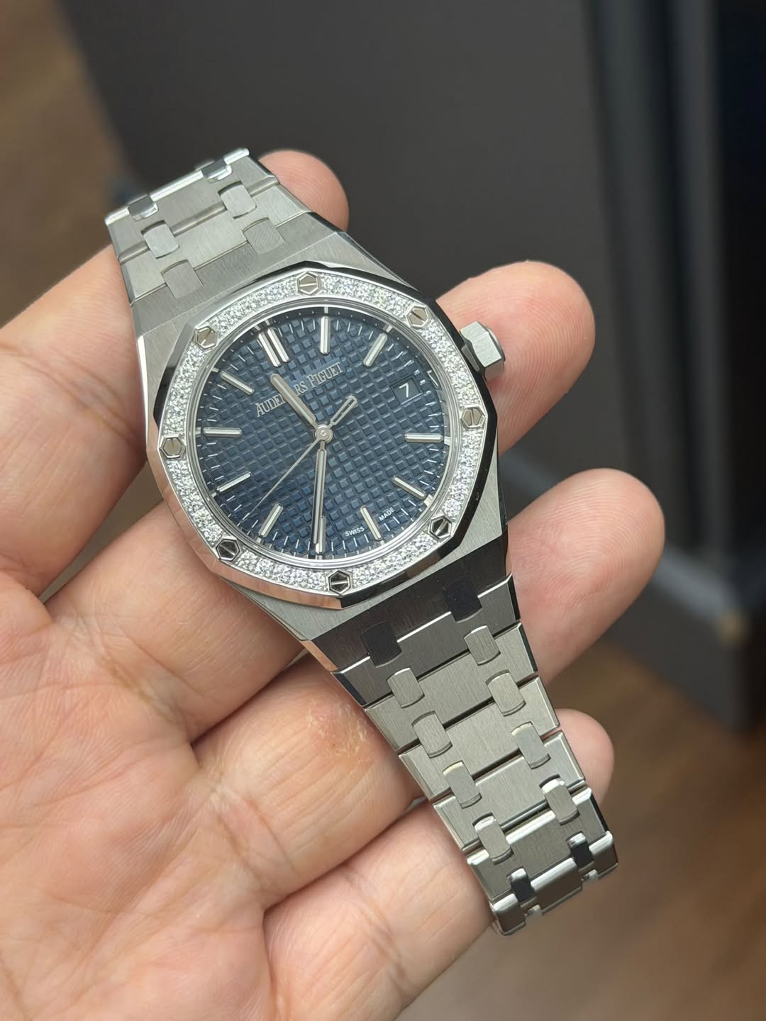 May be an image of wrist watch and text