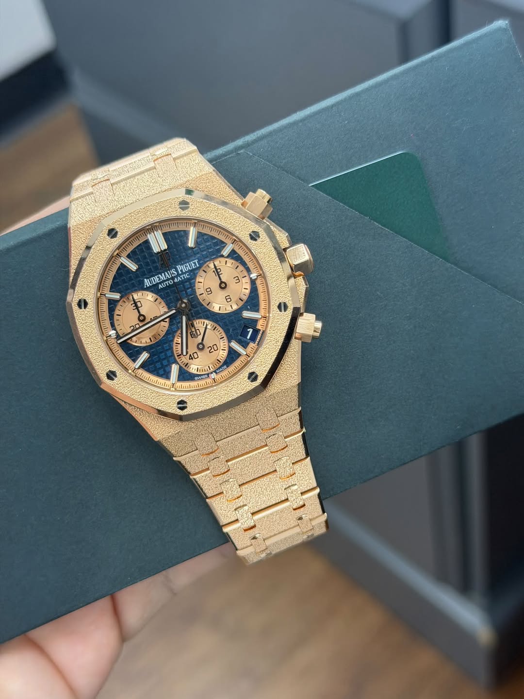 May be an image of wrist watch and text