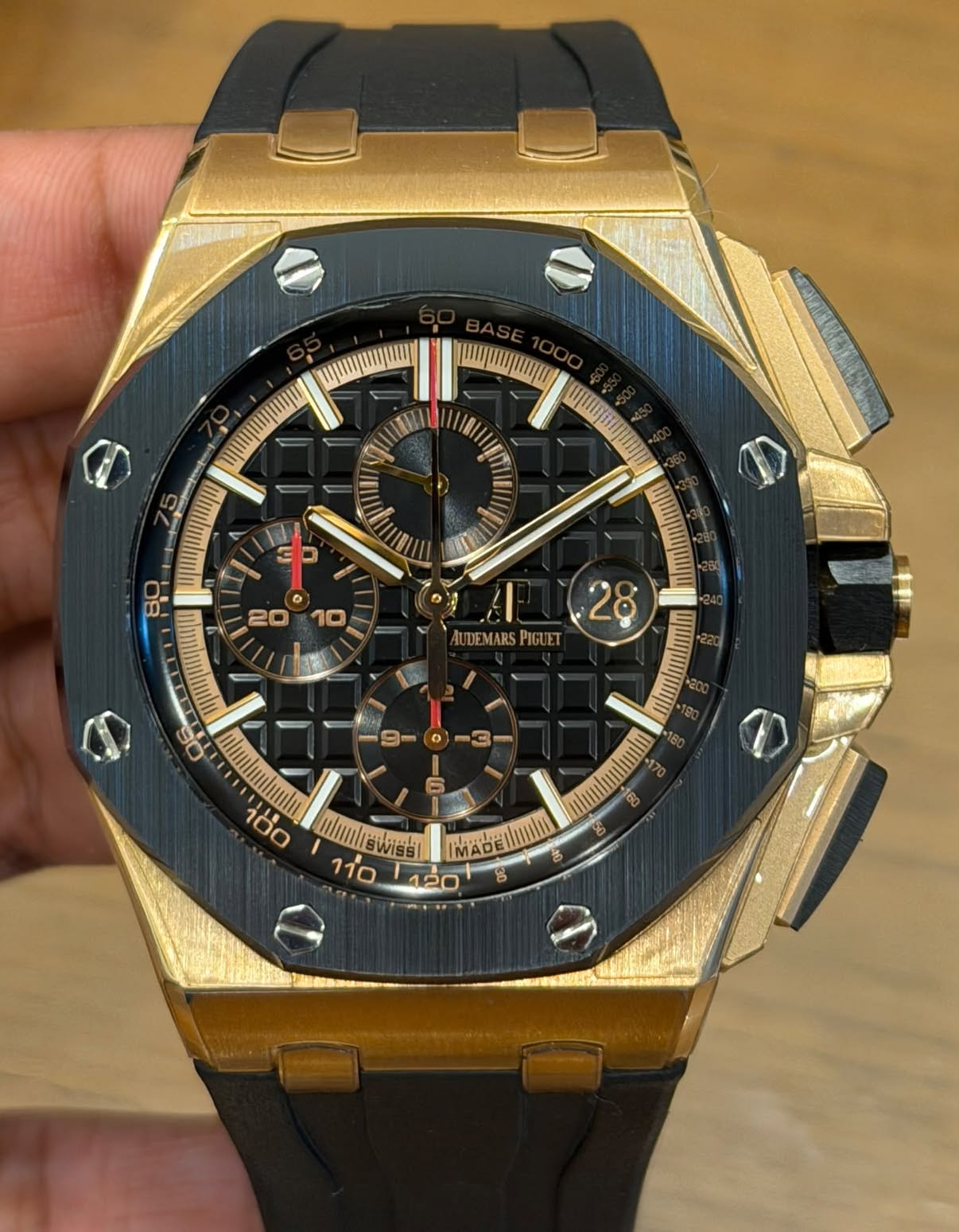 May be an image of wrist watch and text