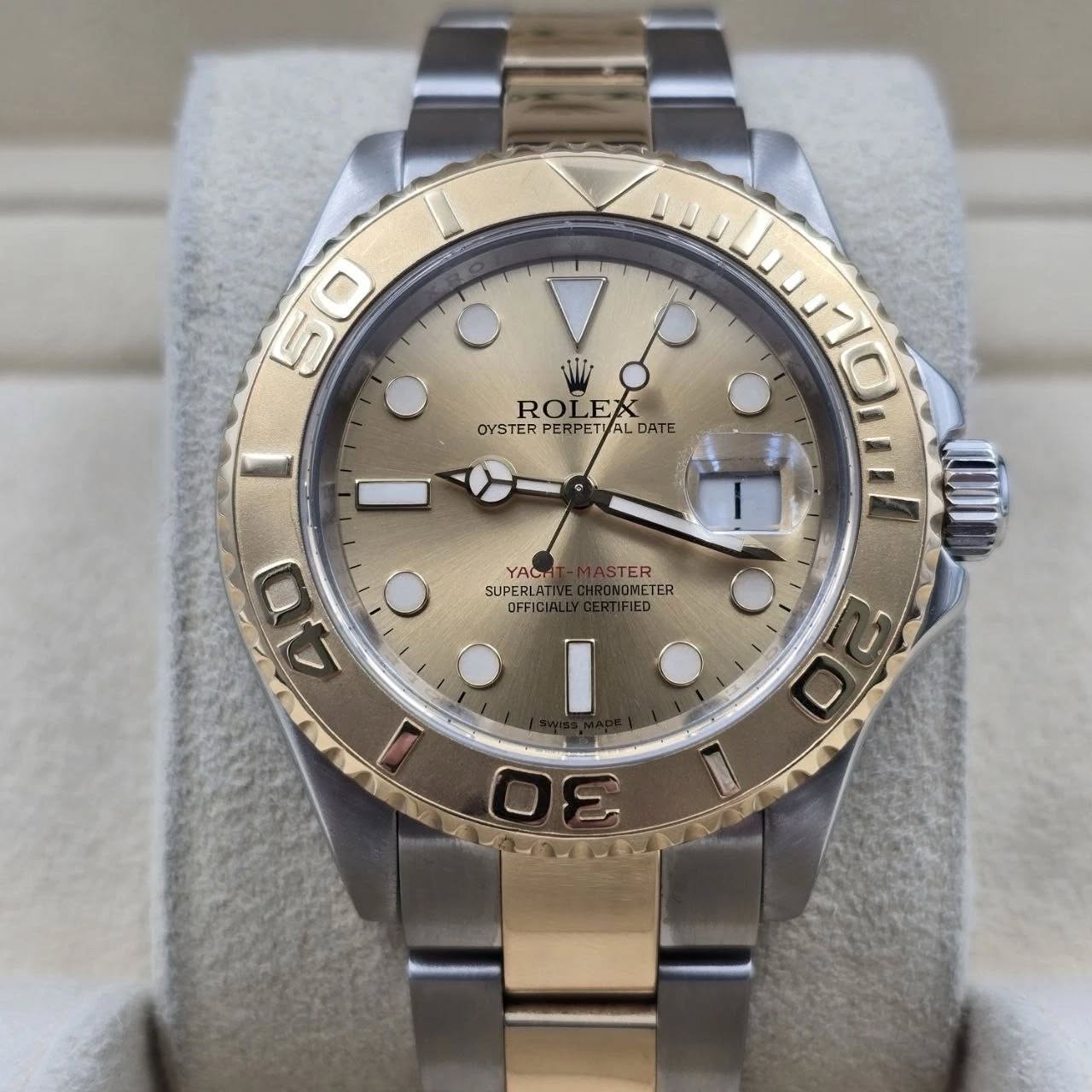 May be an image of wrist watch and text that says '5 50 O NWI ROLEX RO OYSTER PERPETIA OYSTERPERPETHALDAT! PERP AL DATE 1 1 40 0 YAC TER SUPERLAT OMETE FIED ETER OFFICI I B 0 2'