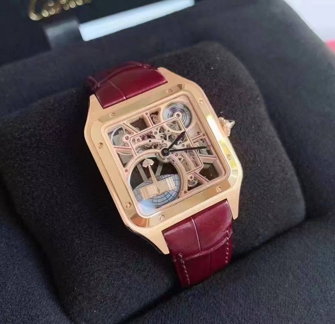May be an image of wrist watch and text