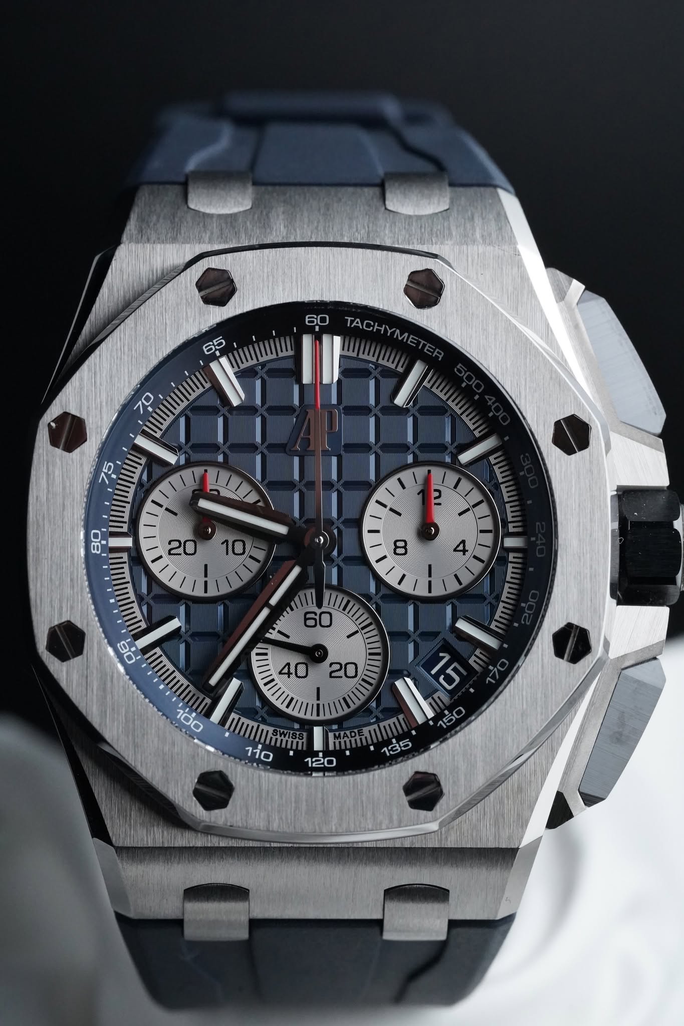 May be an image of wrist watch and text