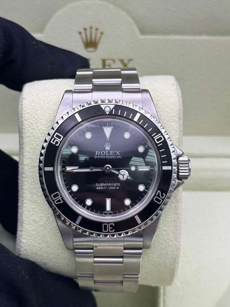 May be an image of wrist watch and text that says '50 ROLEX YSTERPERPETUAL OVSTERPERPETUAL YSTE PERPE 10 SUBMARIN 660/1 200m Ao SWSS 20 ン 4 ۷۸ A K A 30'