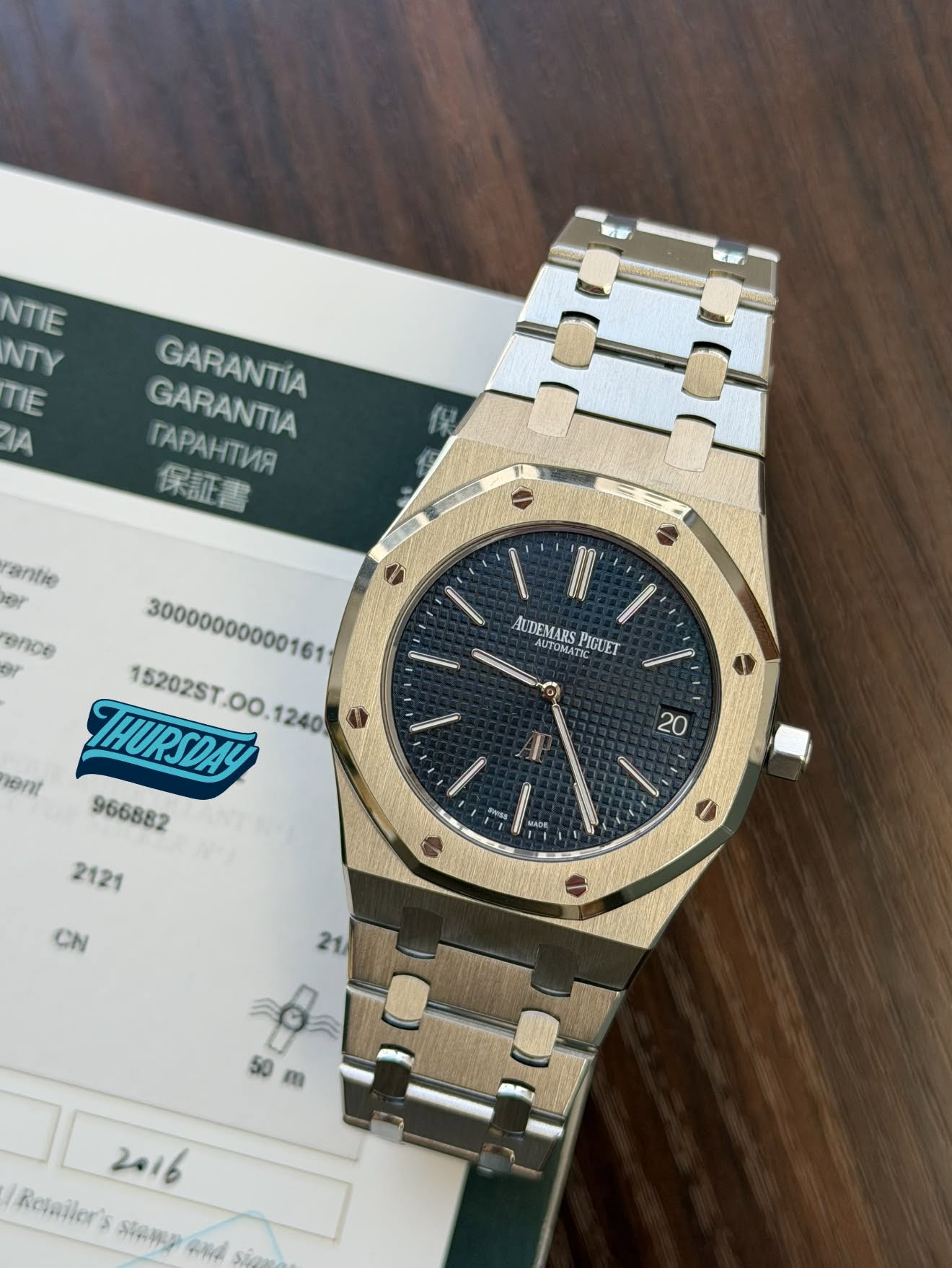 May be an image of wrist watch and text that says 'NTIE NTY ΠΙΕ IA GARANTIA GARANTIA rAPAHTИR 保証書 antie er ence or C aSAuE AUDEMARS TOMATIC PIGUET TOMATI 15202ST ont THURSDAY…