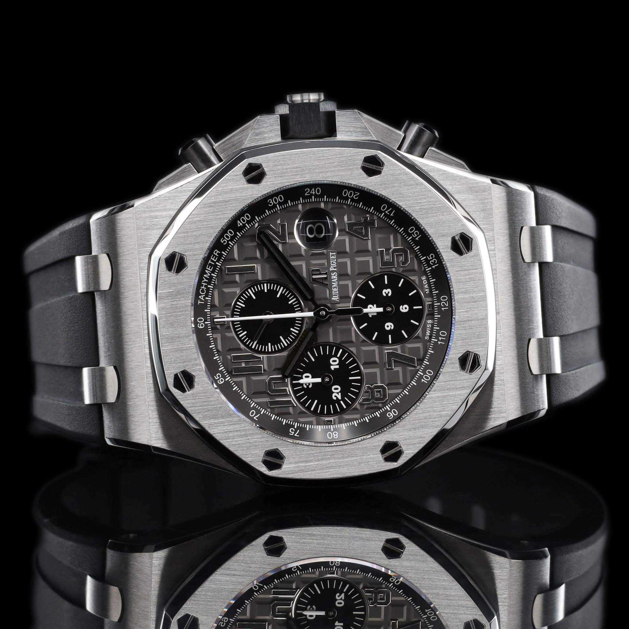 May be an image of wrist watch and text