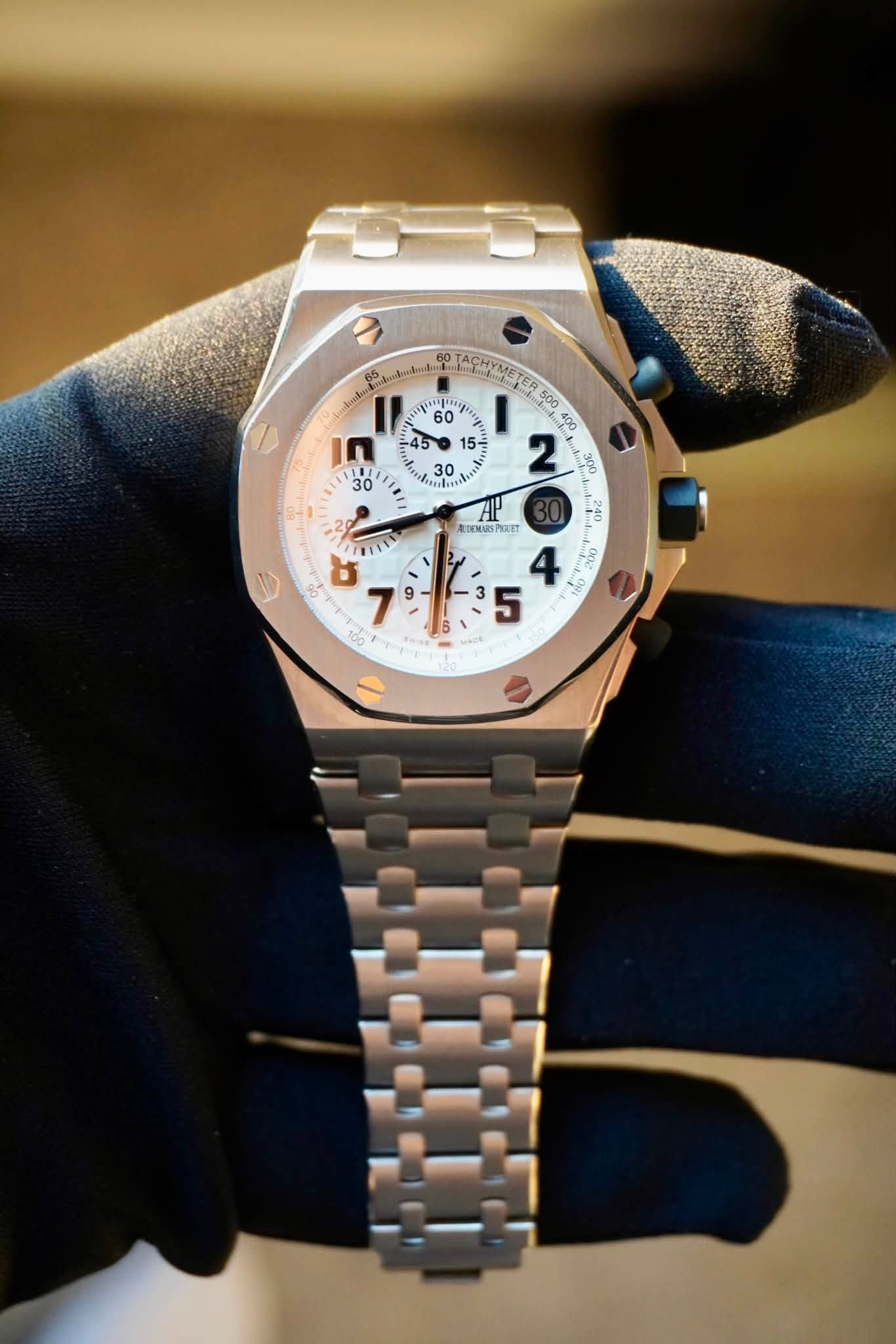 May be an image of wrist watch and text