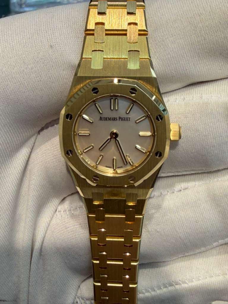 May be an image of wrist watch