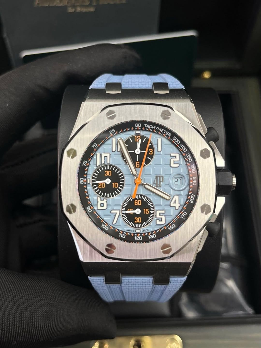 May be an image of wrist watch and text