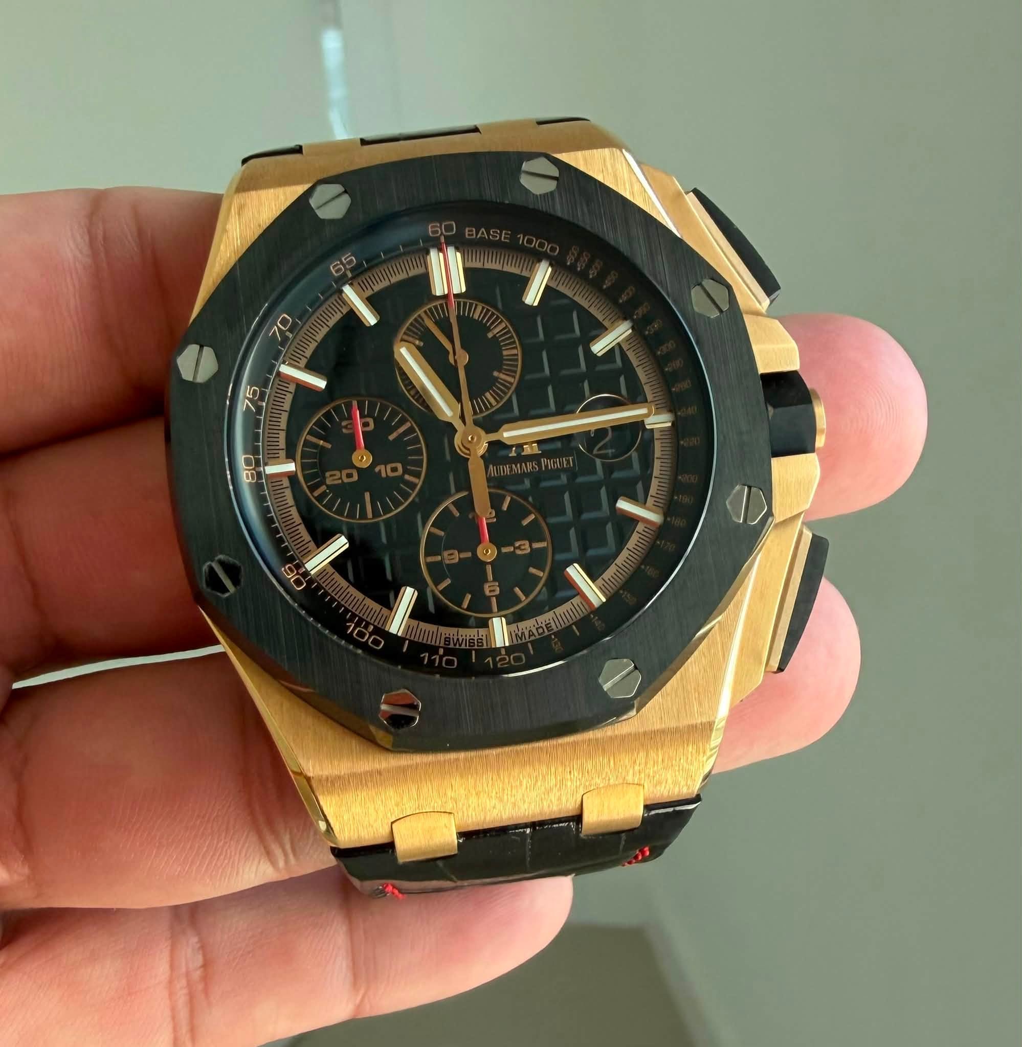 May be an image of wrist watch and text