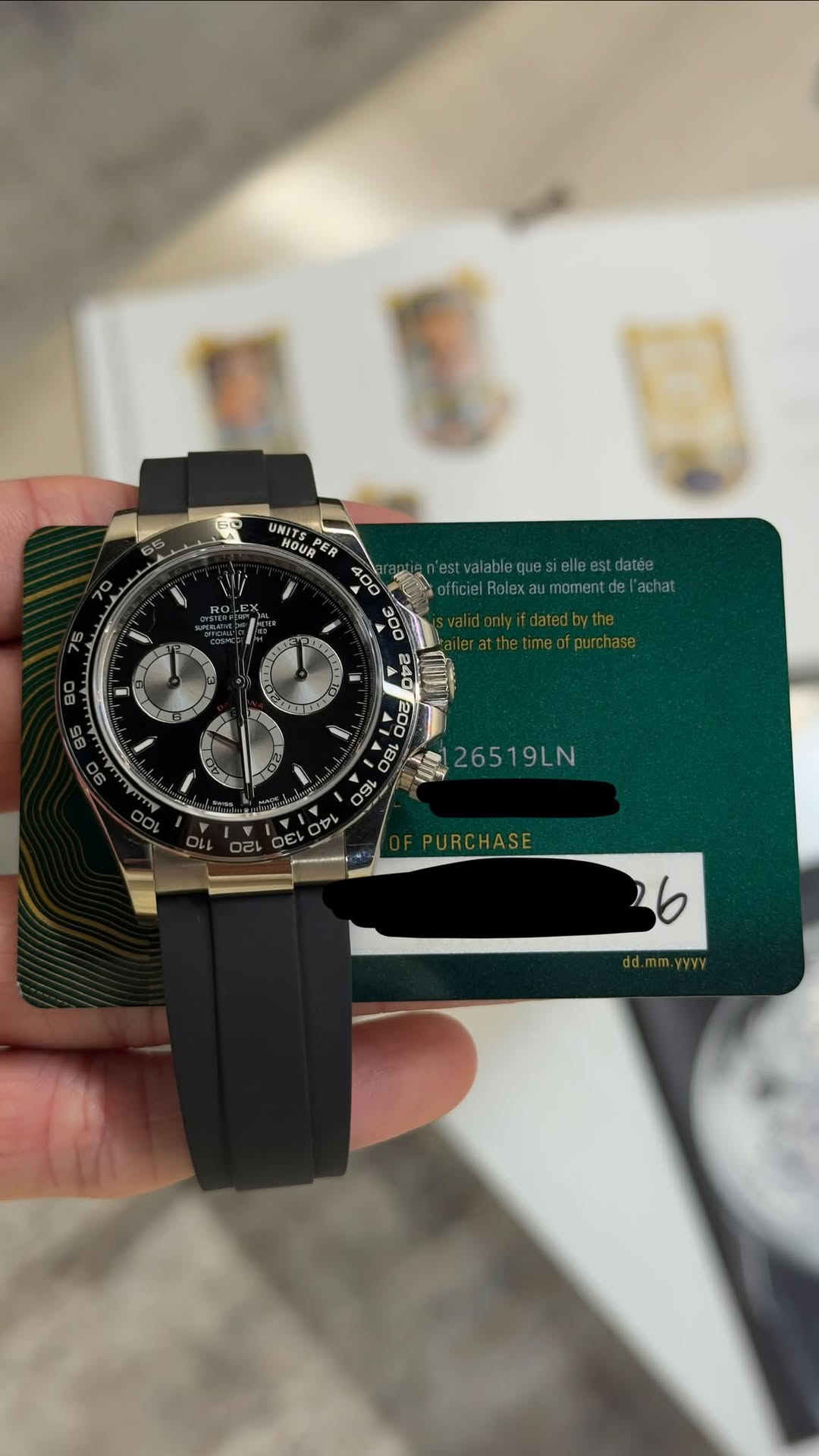May be an image of wrist watch and text